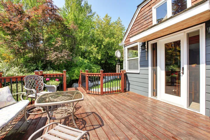 Custom-designed backyard patio in Toledo seamlessly harmonizing with the home's existing architecture and surrounding landscape.
