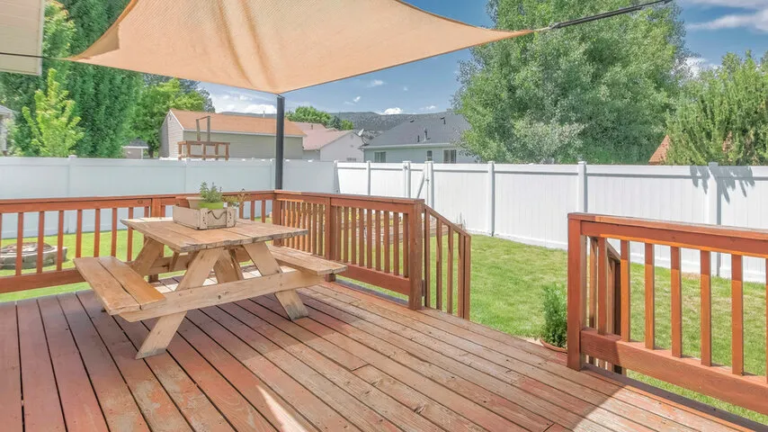 TUFF Deck Builders team constructing a high-quality, durable wood deck tailored to a Toledo homeowner's backyard and local weather conditions.