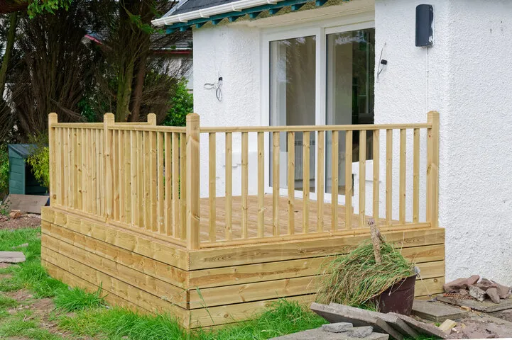 Experienced TUFF Deck Builders team using precision tools to construct a structurally sound floating deck in Toledo.